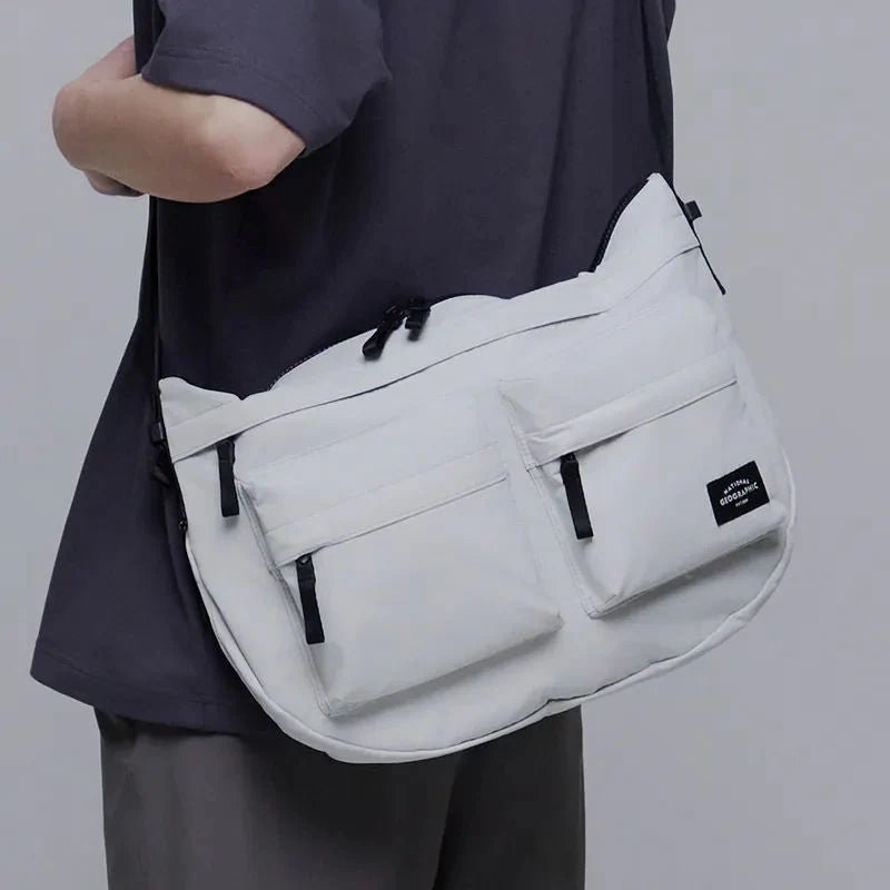 NATGEO CROSS BAG กระเป๋าสะพายคาดอกสำหรับผู้ชายและผู้หญิง - Rev Online